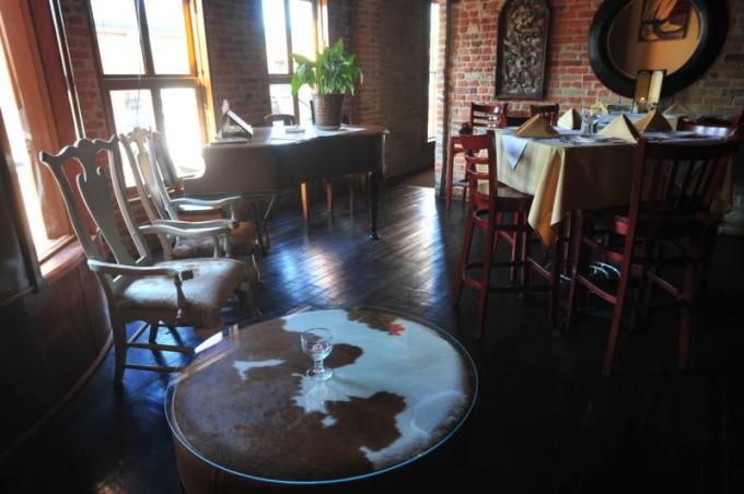 Neighbor's Kitchen & Yard — outdoor dining near the Colorado River in Bastrop